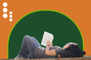 Student lays down reading a paper