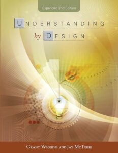 Gold book cover for "Understanding by Design" by Grant Wiggins with a dove on the front and text above