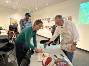David Pyle, Arts Management instructors, presents at a workshop to a group of CSU faculty