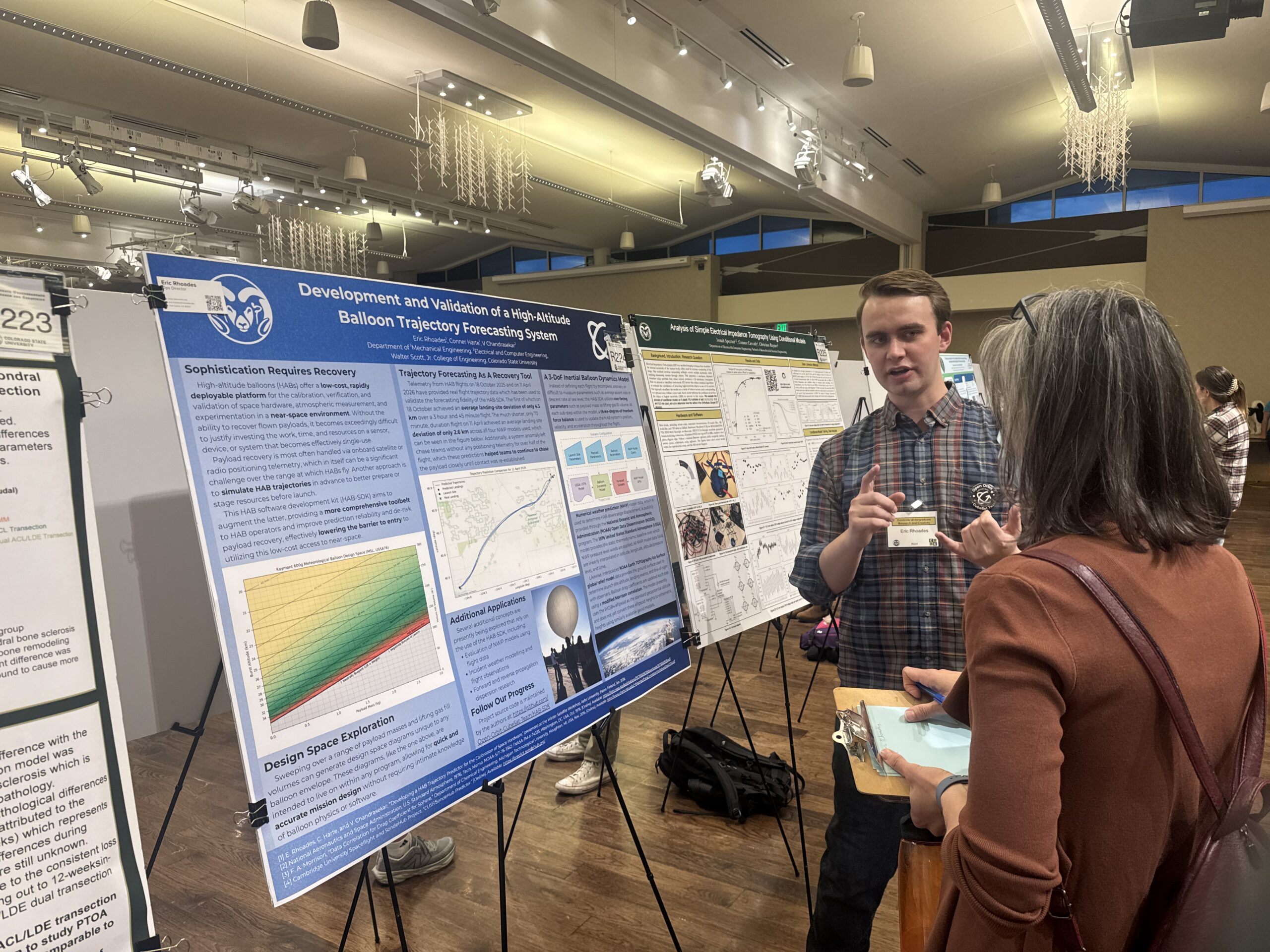 Student presenter at CURC 2026 displays their research presentation to a judge in the Lory Student Center